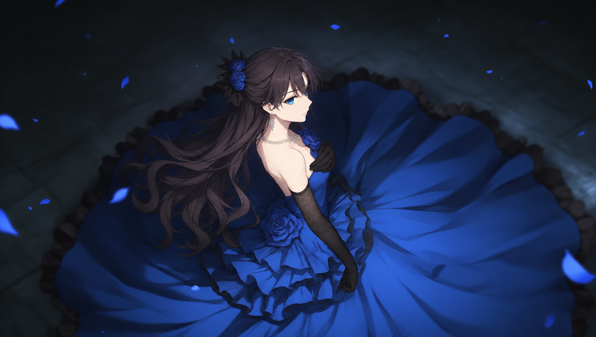 Lynleit looks over her shoulder in a blue gown with black lace, blue roses, and floating blue petals