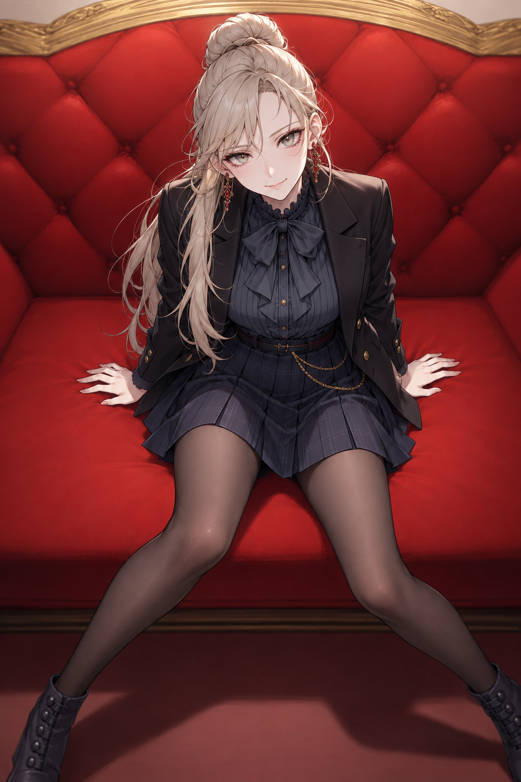 Sherie seated on a red tufted sofa, looking up toward the camera, wearing her dark blazer, pleated skirt, tights and ankle boots.